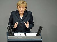 Россия обязана повлиять на террористов, воюющих на Донбассе /Меркель/